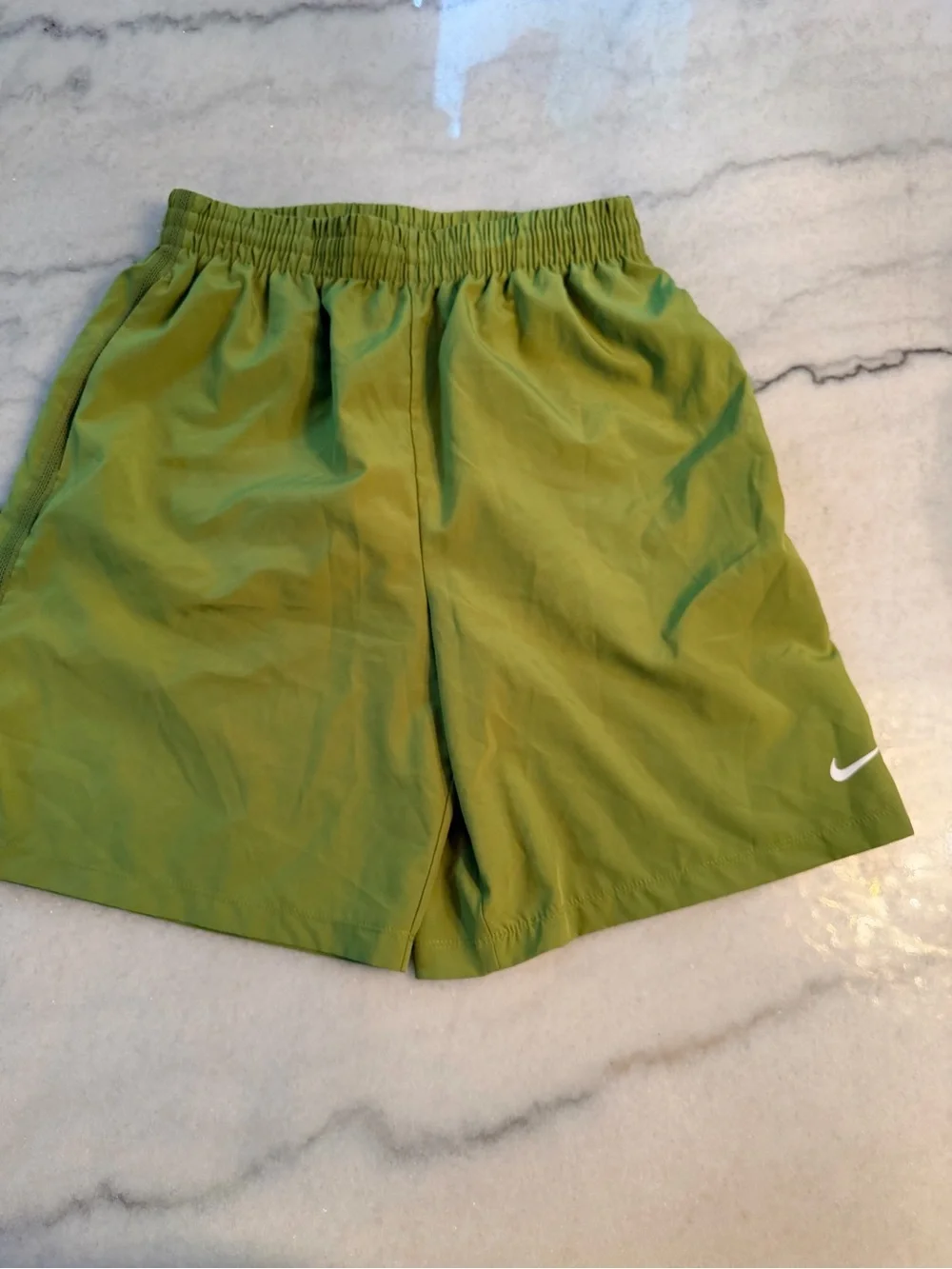 Youth Nike Green Athletic Shorts with White Swoosh